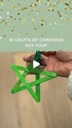 a person holding up a green ornament with gold stars on it and the words 30 crafts of christmas day four