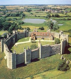 an aerial view of a castle in the countryside