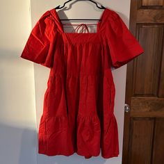 Red Tiered Dress Size Small T Never Worn! Red Cotton Mini Dress For Spring, Red Cotton Dress For Day Out, Red Tiered Dress For Spring, Red Short Sleeve Mini Dress For Day Out, Red Mini Dress With Short Sleeves For Day Out, Red Short Sleeve Sundress, Casual Red Cotton Smocked Dress, Red Cotton Mini Dress, Red Tiered Mini Dress For Spring