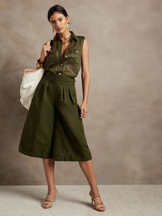 Evoke an adventuresome spirit, this explorer pant mixes utilitarian details with a high-rise-silhouette and flowing, wide-leg for feminine appeal.  Finished with a sturdy double-belted closure, these culottes make an easy choice for warm-weather days Culottes Outfit, Denim Culottes, Wide Leg Crop Pants, Legging Fits, Perfect Pant, Petite Pants, Safari Style, Tailored Dress, Fashion Joggers