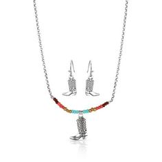 Step into style with the Colorstruck Cowboy Boot Beaded Jewelry Set. This set features a necklace with a silver tone cowboy boot. Brilliant multi-colored beads are placed on a bar alongside a silver tone cowboy boot. This set adds colorful flair to any outfit. The matching earrings are silver tone cowboy boots secured by hypoallergenic French wires. The necklace is a 19 inch split chain. All Montana Silversmiths jewelry and accessories are coated with Montana Armor to prevent tarnish. The necklace in the jewelry set has a lobster clasp and the earrings hang from french hooks. Add some fun and country flair. Bright silver finish and colorful beads create a fun look. Montana Silversmith Jewelry, Tractor Supplies, Tractor Supply, Halloween Animals, French Wire, Cowboy Boot, Jewelry And Accessories, Women Accessories Jewelry, Matching Earrings