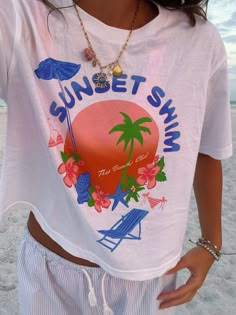 Sunset Swim Boxy Tee – The Beach Club Shop What To Wear To The Bahamas, Summer Crew Neck T-shirt For Poolside, Crew Neck Beachwear T-shirt For Poolside, Beachy Printed Tops For Poolside, Tropical Print T-shirt For Beach In Summer, Tropical Print T-shirt For Beach Season, Summer Cotton T-shirt For Poolside, White Tropical Print T-shirt For Vacation, Summer Tropical Print Top For Poolside