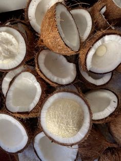 coconuts are cut in half and ready to be eaten