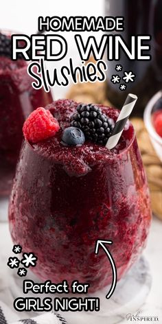 a red wine drink with berries and raspberries in it