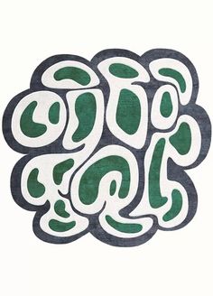 a green and white rug with swirls on it