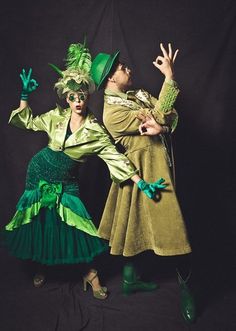 two people dressed up in costumes and hats