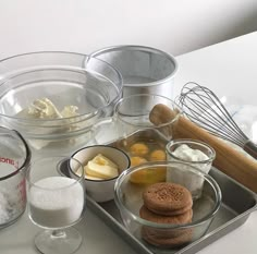 an assortment of ingredients on a tray ready to be made into cookies and pies