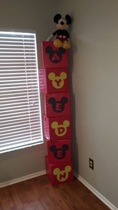 there is a toy tower made to look like mickey mouse