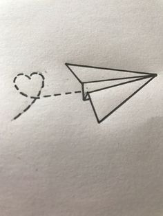 a drawing of a paper airplane with a heart on it's tail and the word i love you written in black ink