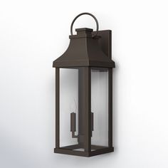 an outdoor wall light with two candles on it