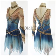 the back of a blue and gold dress with beading on it's shoulders