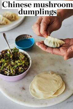 the person is making dumplings on the table