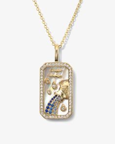 Know your strengths, never forget who you are. Our exclusive Zodiac Amulets are carefully hand-carved with Mother of Pearl inlay set in a pave frame with colorful gems unique to each sign. These double-sided pendants also include personalized fierce features engraved on the back to remind you of your own unique traits.