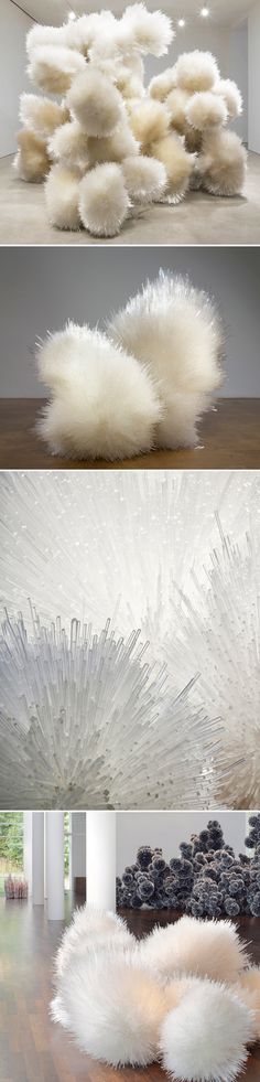 three different views of an art installation with white fur on the floor and in the background