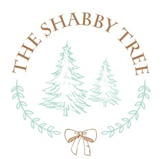 the shabby tree logo with a bow and evergreen trees in the center, on a white background