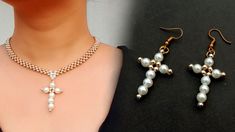 two necklaces with pearls on them and one has a cross charm hanging from it