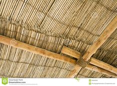 bamboo roof that has been made from wood and is ready to be used as a ceiling