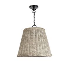 a light fixture with a woven shade hanging from it's side, on a white background