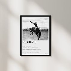 a black and white photo of a man on a horse with the words revival above it