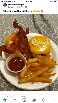 a white plate topped with fries and bacon