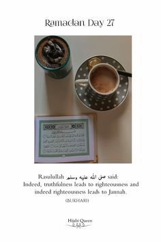 a cup of coffee sitting on top of a saucer next to a framed book