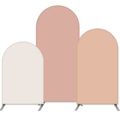 three pastel colored archs with metal legs