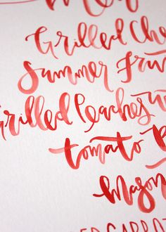 red ink on white paper with the words summer fun, wild and wonderful written in cursive writing