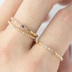 Stackable Yellow Gold Sapphire Birthstone Ring, Stackable 14k Gold Blue Sapphire Ring, Stackable Blue Sapphire Ring In 14k Gold, Blue Sapphire Stackable Ring In 14k Gold, 14k Gold Sapphire Stackable Ring, Yellow Gold Stackable Sapphire Ring, Blue 14k Gold Stackable Rings, Yellow Gold Stackable Rings With Sapphire In Round Band, Dainty Blue 14k Gold Rings