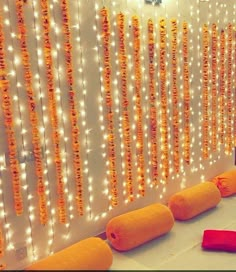 a room with lights and decorations on the wall