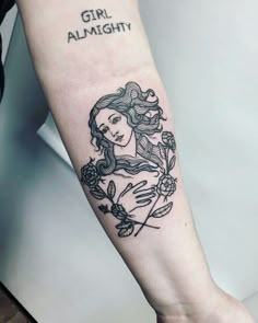 a woman's arm with a tattoo on it that says girl alumight