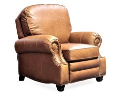 a brown leather recliner chair with studded trimmings on the arms and back