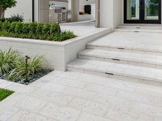 a house with steps leading up to the front door