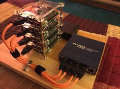 an array of electronic equipment sitting on top of a wooden table