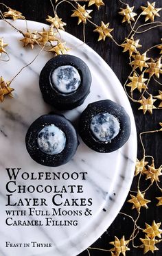 three chocolate layer cakes on a marble plate with gold stars in the background and text overlay