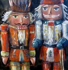 two nutcrackers are standing next to each other