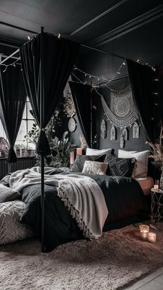 a black and white bedroom with lots of lights on the ceiling, bedding and curtains