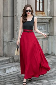 "Crafted from premium linen fabric, this skirt offers a combination of comfort and sophistication. The high-waisted design accentuates your waistline, creating a flattering silhouette. The swing style adds a playful and feminine touch, allowing for effortless movement and flow. Whether you're going for a casual day out or dressing up for a special occasion, this red linen skirt is a versatile and timeless addition to your wardrobe. DETAIL * 100% linen * High waisted skirt * Two side pockets * Plus size skirt * Circle skirt * Perfect summer spring skirt * Dry clean * The model is 168cm (5′ 6″) tall with a 80cm (31.5\") bust, 66cm (26\") waist. She is wearing a XS. CUSTOM MADE SERVICE If you * Change other color * Need a better fit * Can't find your size in our size Chart * Change the Style Raspberry Wool Maxi Skirt High Waist, Long Red Skirt Tight, Affordable Casual Red Pleated Skirt, Luxury Red Maxi Skirt For Spring, Luxury Red Maxi Skirt For Summer, Affordable Red High Waist Skirt, High Waisted Skirt Red, Luxury Red Skirt For Workwear, Cheap Red Spring Skirt