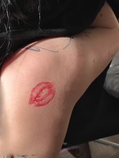 Tel lip print tattoo, lipstick print tattoo, red shoulder tattoo idea, eye tattoo, red eye tattoo design, women tattoo, tattoo for girls Lip Print Tattoos, Kiss Tattoos, Lip Tattoos, Subtle Tattoos, Little Tattoos