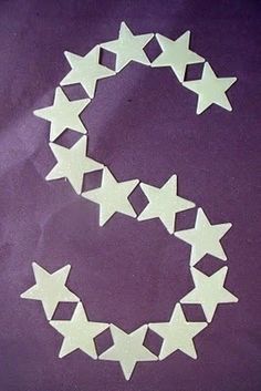 white stars are arranged in the shape of a crescent