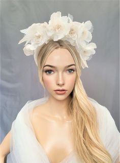 Presenting a beautiful ivory duchess satin covered headband, which is 2.5 cms in width at the widest part and padded to a height of 1.5 cms approximately (the headband height). This stunning headpiece is adorned with an ivory chiffon flower vine which extends above the headband and is wired so the flowers can be adjusted slightly to work with your hair style, and a slight spray of veiling. Perfect to add that wow factor to your outfit.  If you would like the design customising at all, or an alte Adjustable Tulle Headpiece For Wedding, Adjustable Tulle Fascinator For Wedding, Tulle Headband For Wedding, Adjustable Tulle Wedding Fascinator, Elegant Tulle Hair Accessories For Wedding, Wedding Tulle Headband, Elegant Wedding Headband Veil, Elegant Wedding Veil With Headband, Elegant Organza Bridal Accessories For Ceremony