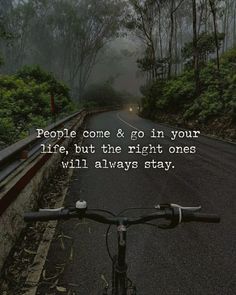 a bicycle parked on the side of a road with trees in the background and a quote about people one & go in your life, but the right ones will always stay