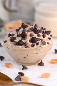 a bowl filled with chocolate chips and cream