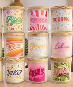 there are many different colored labels on the jars