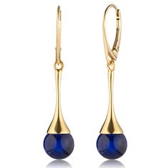 PRICES MAY VARY. HIGH-QUALITY MATERIALS: Crafted from gold-plated ag925 sterling silver and unique sapphire Blue amber, our Blue Amber Drop Earrings are not just beautiful, but also exceptionally durable and built to last. PERFECT SIZE: These earrings strike the perfect balance, not too big and not too small (1.77x0.35inch), ensuring they complement your style effortlessly. ENHANCED COMFORT AND BEAUTY: The gold-plated sterling silver fitting and lever-back closure not only offer a secure and com Blue 14k Gold Drop Earrings, Formal Baltic Amber Drop Earrings, Elegant Baltic Amber Teardrop Earrings, Egyptian Style Earrings, Blue Amber Jewelry, Blue Teardrop Brass Earrings, Blue Amber, Versatile Jewelry, Amber Earrings