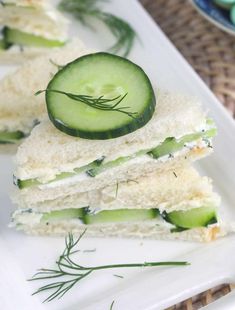 cucumber and dill sandwich on a white plate