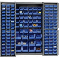 two shelves filled with blue plastic bins