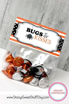 a bag filled with halloween candy on top of a table