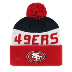 a san francisco giants knit beanie hat with the number four on it and a pom