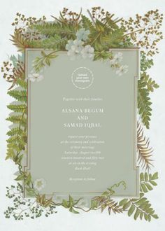 a wedding card with flowers and leaves