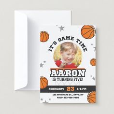 a basketball birthday party card with an image of a child's face on it